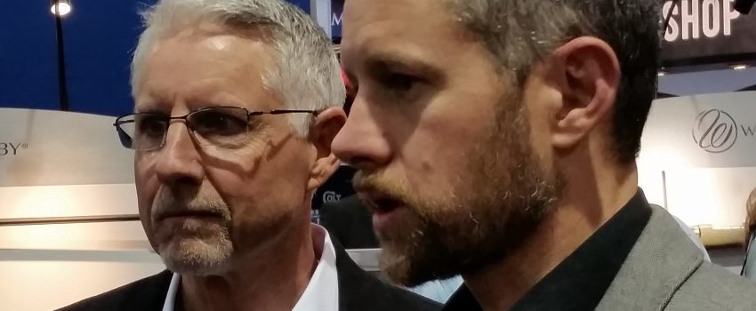 Adam Weatherby, right, accepts the leadership of the company from his father, Ed.