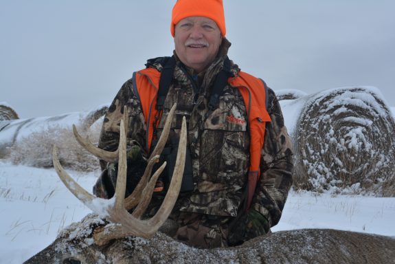 Most bucks will grow big antlers if allowed to live to maturity.  Get your neighbors in on the program for best results.