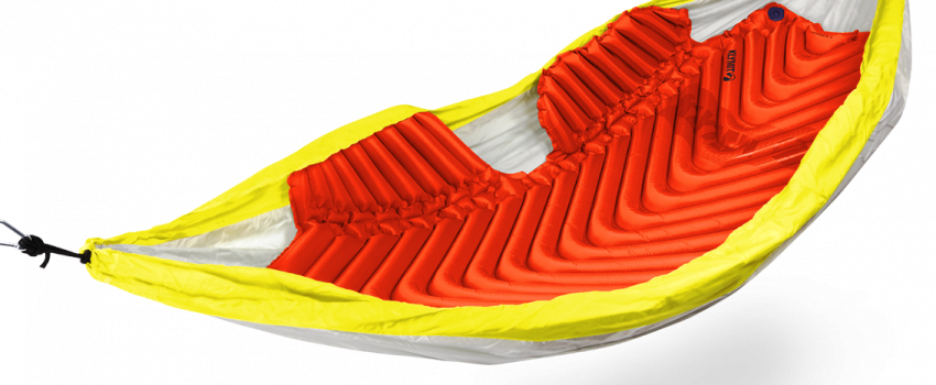 KLYMIT makes a variety of ultra-compact sleeping pads and sleeping bags.